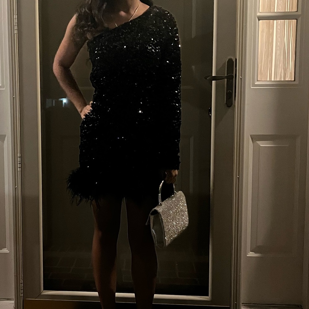 black sequence off the shoulder dress with feathers